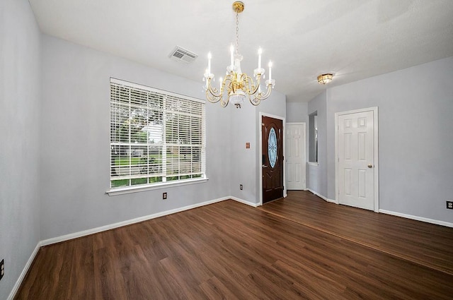 1123 Woodley Bnd, Sugar Land, TX 77479 - empty room with a chandelier and dark wood-style flooring