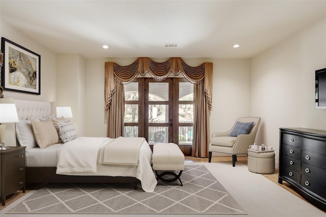 701 W Friar Tuck Ln, Houston, TX 77024 - bedroom with french doors and recessed lighting