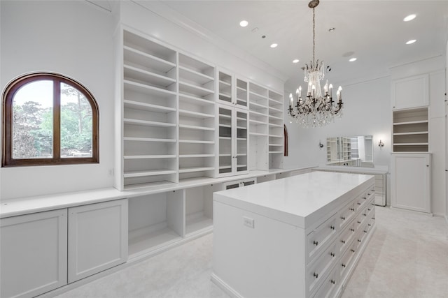 701 W Friar Tuck Ln, Houston, TX 77024 - walk in closet with a chandelier