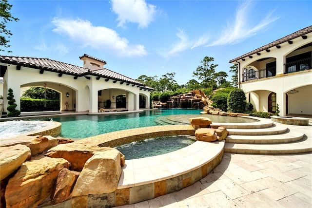 701 W Friar Tuck Ln, Houston, TX 77024 - view of pool with a patio and a pool with connected hot tub