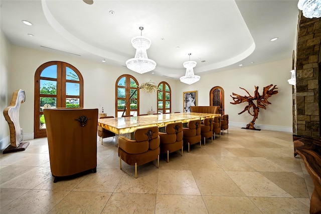701 W Friar Tuck Ln, Houston, TX 77024 - dining room featuring a tray ceiling, recessed lighting, plenty of natural light, and french doors