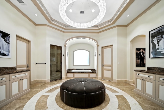 701 W Friar Tuck Ln, Houston, TX 77024 - full bathroom featuring inlaid floor details, ornamental molding, a garden tub, a high ceiling, and vanity