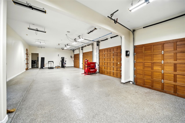 701 W Friar Tuck Ln, Houston, TX 77024 - garage with baseboards