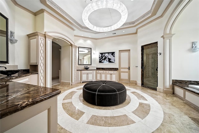 701 W Friar Tuck Ln, Houston, TX 77024 - community lobby featuring a high ceiling, ornamental molding, and recessed lighting