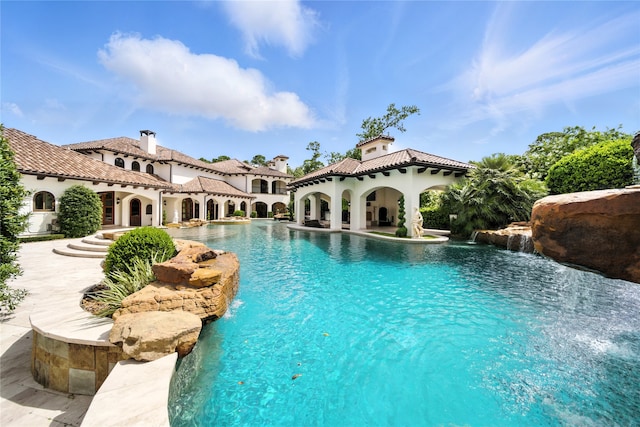 701 W Friar Tuck Ln, Houston, TX 77024 - swimming pool with a patio area