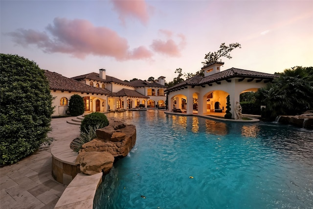 701 W Friar Tuck Ln, Houston, TX 77024 - swimming pool with a patio area