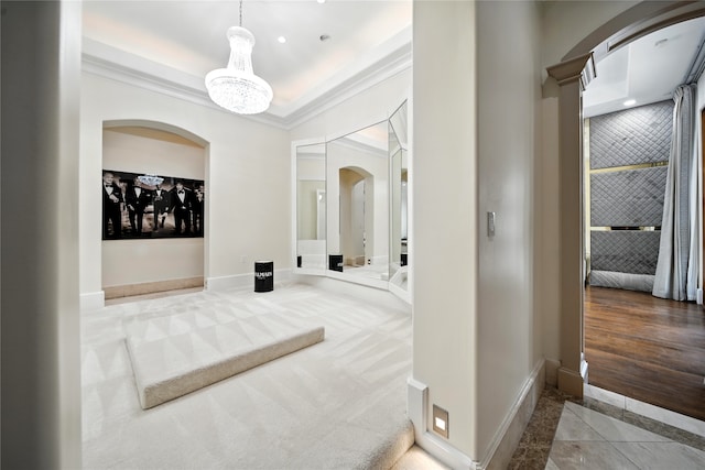 701 W Friar Tuck Ln, Houston, TX 77024 - hallway featuring arched walkways, crown molding, and inlaid floor details