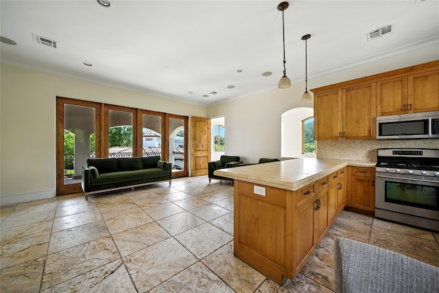 701 W Friar Tuck Ln, Houston, TX 77024 - kitchen featuring appliances with stainless steel finishes, light countertops, a peninsula, decorative backsplash, and crown molding