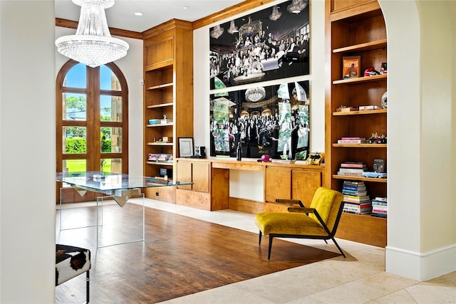 701 W Friar Tuck Ln, Houston, TX 77024 - living area with a chandelier, built in features, french doors, and tile patterned floors