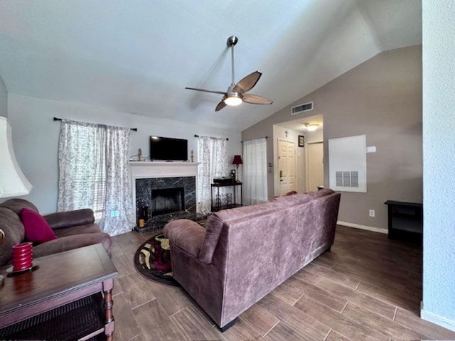 2211 S Kirkwood Rd Unit 35, Houston, TX 77077 - living room featuring ceiling fan, vaulted ceiling, a fireplace, and wood finished floors