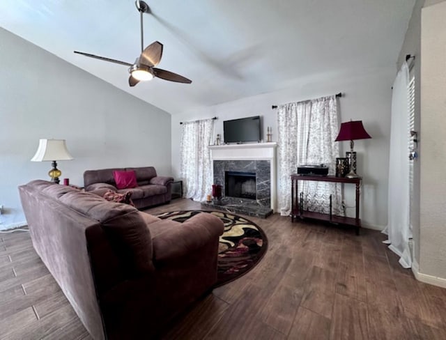 2211 S Kirkwood Rd Unit 35, Houston, TX 77077 - living room with a ceiling fan, wood finished floors, lofted ceiling, plenty of natural light, and a premium fireplace