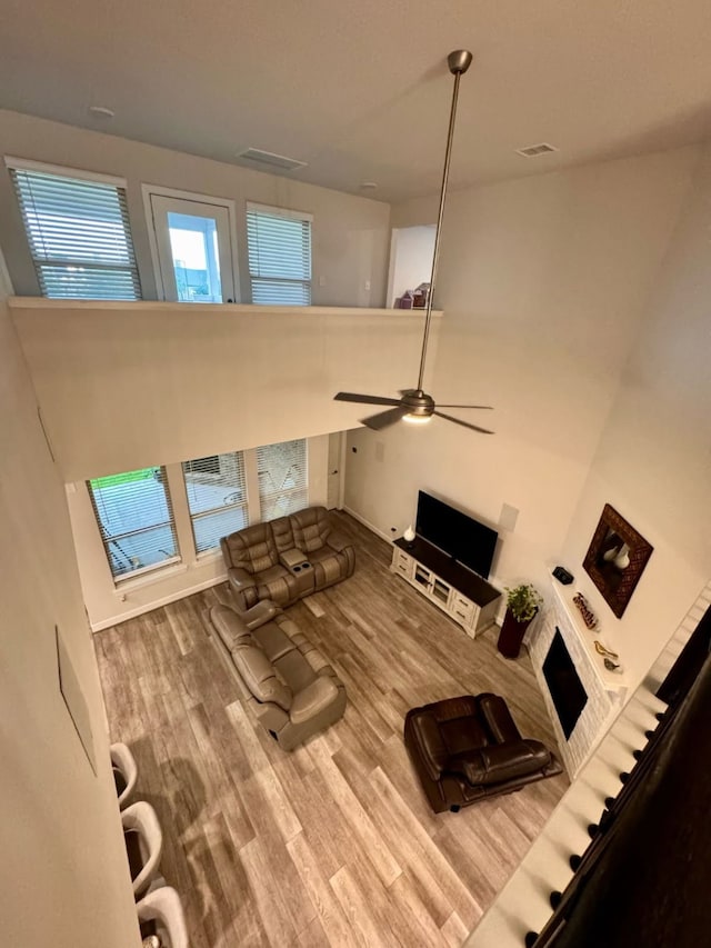 15814 Weston Ridge Dr, Humble, TX 77346 - living area with wood finished floors and a ceiling fan