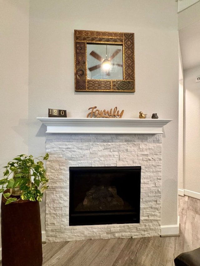 15814 Weston Ridge Dr, Humble, TX 77346 - detailed view of wood finished floors and a stone fireplace