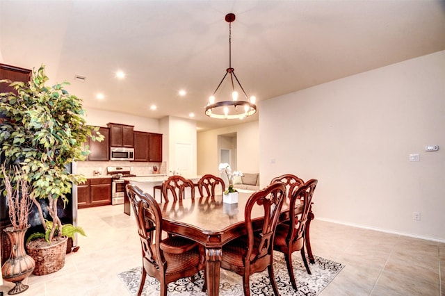 12223 Antilles Ln, Conroe, TX 77304 - dining room featuring recessed lighting, light tile patterned flooring, and a chandelier