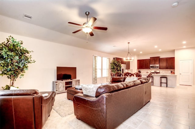 12223 Antilles Ln, Conroe, TX 77304 - living area featuring ceiling fan, recessed lighting, a chandelier, and light tile patterned flooring