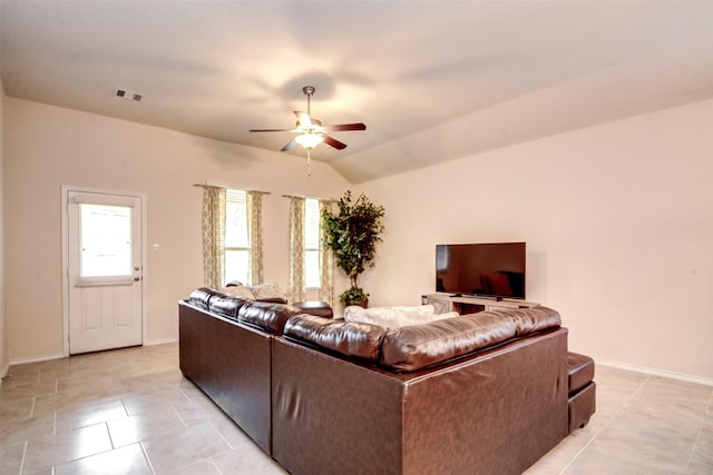 12223 Antilles Ln, Conroe, TX 77304 - living room featuring a ceiling fan, light tile patterned floors, and vaulted ceiling