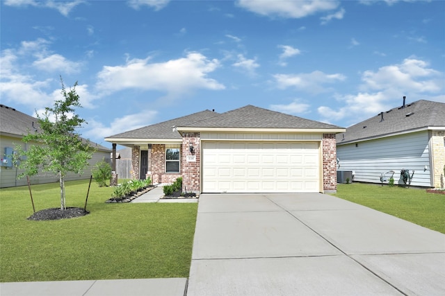 638 E Fairway Lake Dr, Alvin, TX 77511 - ranch-style house with driveway, roof with shingles, a front lawn, brick siding, and a garage
