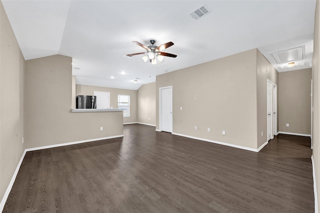 638 E Fairway Lake Dr, Alvin, TX 77511 - unfurnished living room featuring attic access, a ceiling fan, lofted ceiling, and dark wood-type flooring