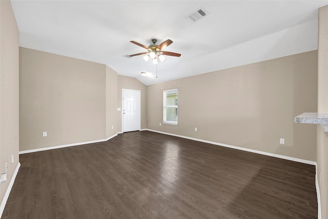638 E Fairway Lake Dr, Alvin, TX 77511 - empty room with a ceiling fan, vaulted ceiling, and dark wood-type flooring