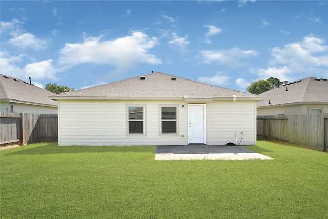 638 E Fairway Lake Dr, Alvin, TX 77511 - rear view of house with a patio, a fenced backyard, and a shingled roof