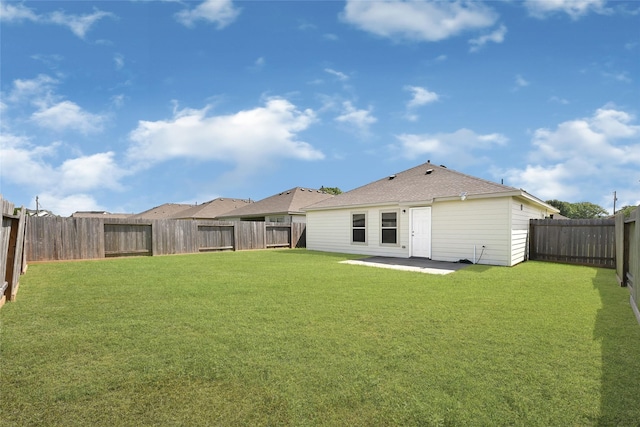 638 E Fairway Lake Dr, Alvin, TX 77511 - rear view of property featuring a fenced backyard, a patio area, and a shingled roof