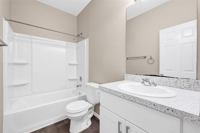 638 E Fairway Lake Dr, Alvin, TX 77511 - bathroom with vanity, wood finished floors, and shower / tub combination