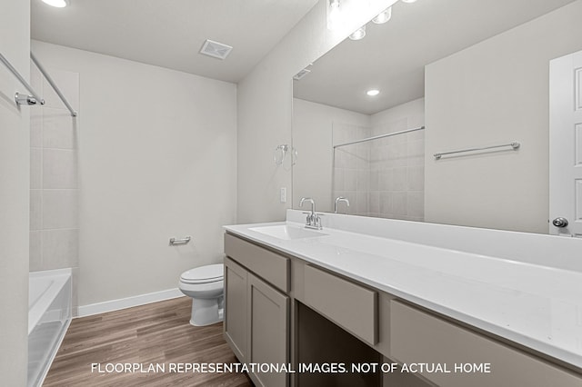 20638 Draper Rd, Tomball, TX 77377 - full bathroom with vanity, wood finished floors, shower / tub combination, and recessed lighting