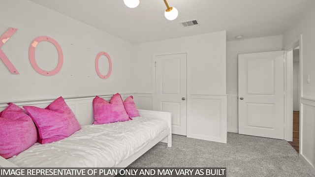 23748 Patchouli Terrace Dr, Splendora, TX 77372 - bedroom featuring carpet flooring and wainscoting