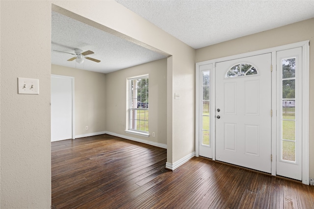 27093 Frye Rd, Splendora, TX 77372 - entryway with a textured ceiling, dark wood finished floors, and ceiling fan