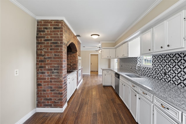 27093 Frye Rd, Splendora, TX 77372 - kitchen with white cabinetry, crown molding, dark wood-style flooring, ceiling fan, and decorative backsplash