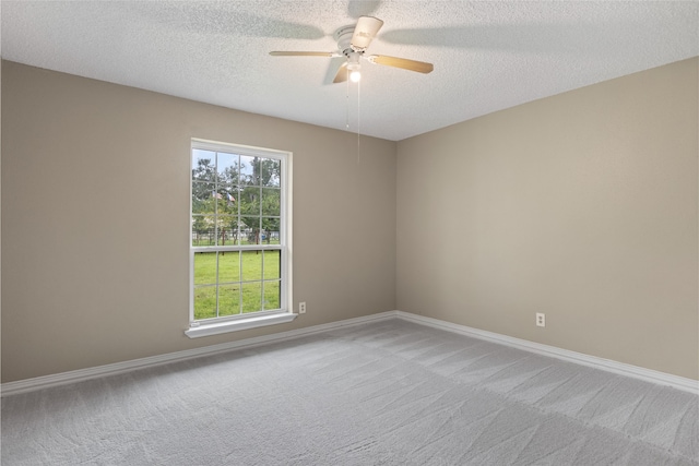 27093 Frye Rd, Splendora, TX 77372 - carpeted spare room with ceiling fan and a textured ceiling