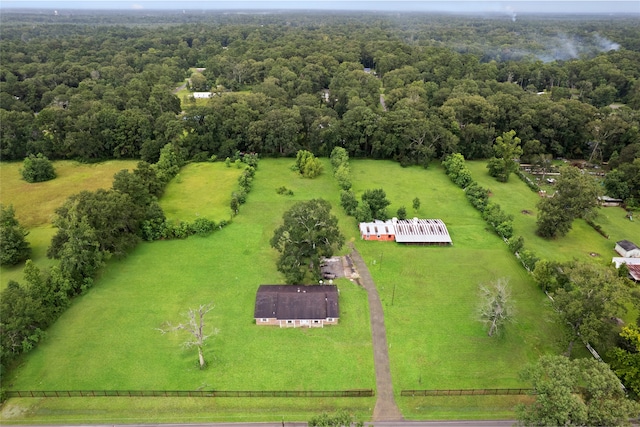 27093 Frye Rd, Splendora, TX 77372 - aerial view of sparsely populated area featuring a heavily wooded area