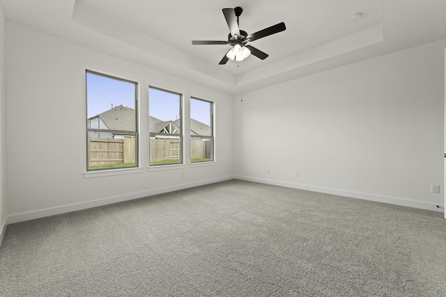 16710 Yaklin Meadow Ct, Humble, TX 77346 - carpeted spare room featuring a raised ceiling and a ceiling fan