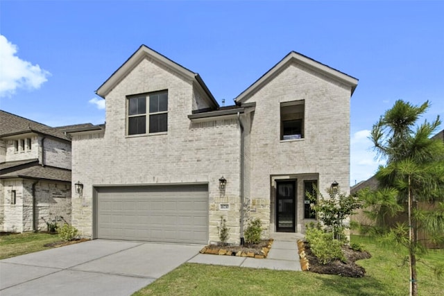 16710 Yaklin Meadow Ct, Humble, TX 77346 - view of front of house with a garage, driveway, and brick siding