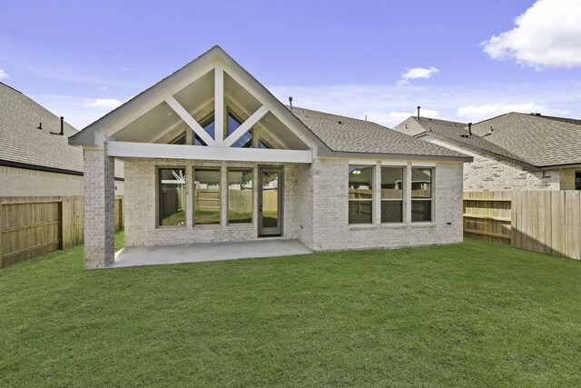 16710 Yaklin Meadow Ct, Humble, TX 77346 - back of house featuring brick siding, a fenced backyard, and a patio area