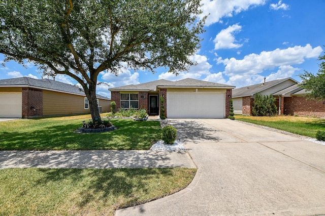 631 Kiley Dr, Houston, TX 77073 - ranch-style home featuring brick siding, an attached garage, driveway, and a front yard