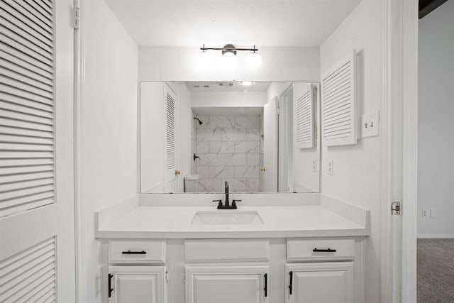 9901 Sharpcrest St Unit K-3, Houston, TX 77036 - bathroom featuring vanity, a shower, and a closet