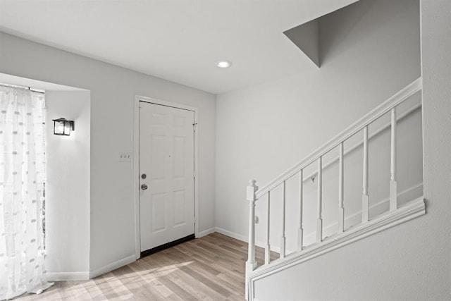 9901 Sharpcrest St Unit K-3, Houston, TX 77036 - entryway with wood finished floors and recessed lighting