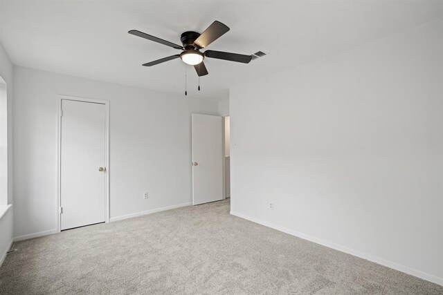 9901 Sharpcrest St Unit K-3, Houston, TX 77036 - unfurnished bedroom featuring carpet floors and ceiling fan