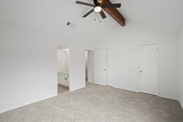 9901 Sharpcrest St Unit K-3, Houston, TX 77036 - unfurnished bedroom with light colored carpet, ensuite bath, and two closets