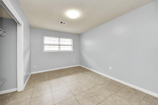 743 Eastlake St, Houston, TX 77034 - unfurnished room featuring tile patterned floors and baseboards