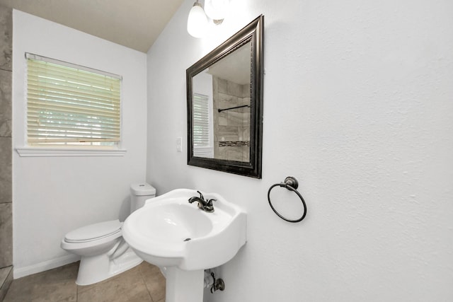 743 Eastlake St, Houston, TX 77034 - bathroom featuring a shower and tile patterned floors