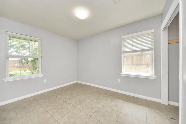 743 Eastlake St, Houston, TX 77034 - unfurnished room featuring plenty of natural light and light tile patterned floors