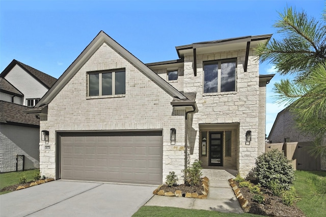 16738 Yaklin Meadow Ct, Humble, TX 77346 - french country home with stone siding, a garage, and driveway