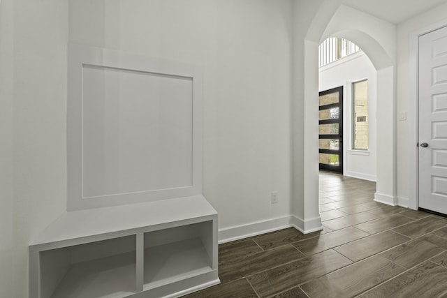 16738 Yaklin Meadow Ct, Humble, TX 77346 - mudroom featuring plenty of natural light, arched walkways, and wood finish floors