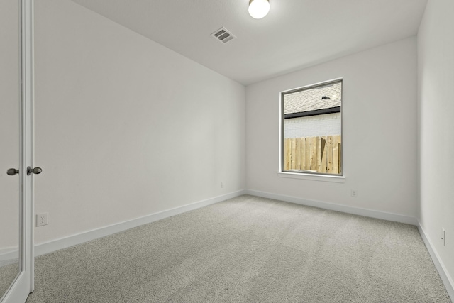 16738 Yaklin Meadow Ct, Humble, TX 77346 - empty room with light colored carpet and baseboards
