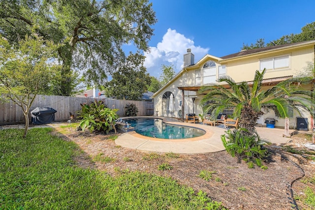 16307 Mango Ridge Ct, Humble, TX 77396 - view of pool with a patio area and a fenced backyard