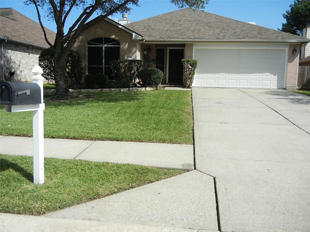 4822 Edgegate Dr, Spring, TX 77373 - single story home with an attached garage, concrete driveway, roof with shingles, brick siding, and a front yard