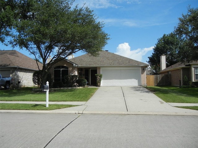 4822 Edgegate Dr, Spring, TX 77373 - ranch-style house featuring concrete driveway, a garage, and a shingled roof