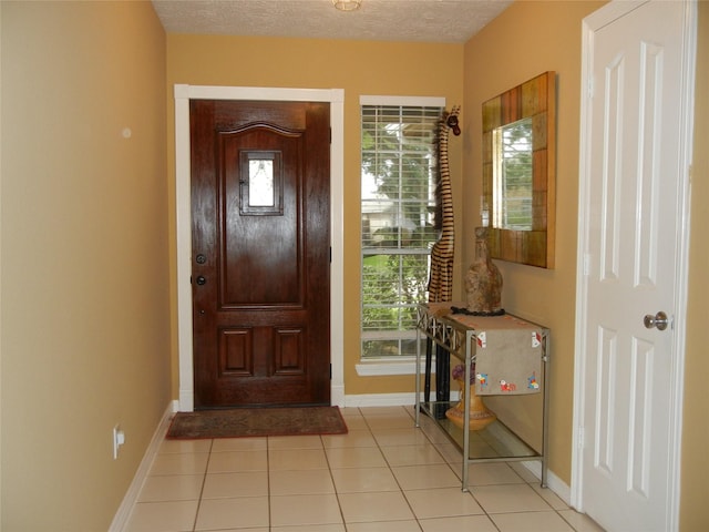 4822 Edgegate Dr, Spring, TX 77373 - entrance foyer with baseboards and light tile patterned flooring